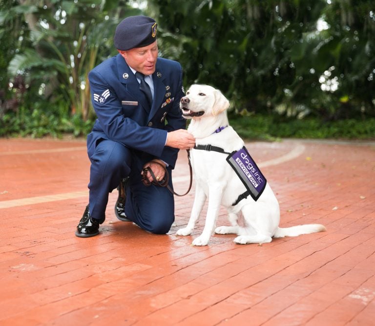 Veteran with Service Dog from Dogs Inc. and Hollywood Feed