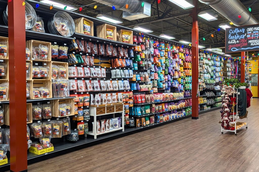 Hollywood feed store display of dog treats, Affordable pet car with price match guarantee