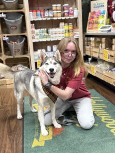 Hollywood Feed Store Employee with their dog