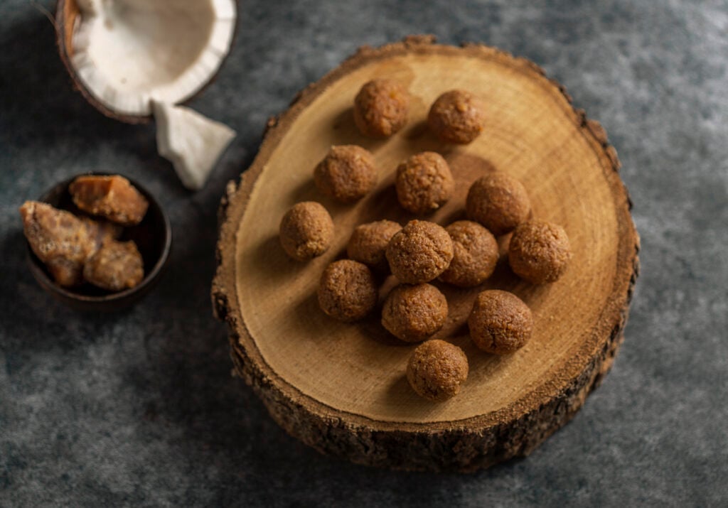 coconut glycerin in dog treats, Coconut Laddoo with jaggery or Coconut Sweet Laddoo or Nariyal Laddu is a Popular Festival Food from India. Served over moody background, selective focus